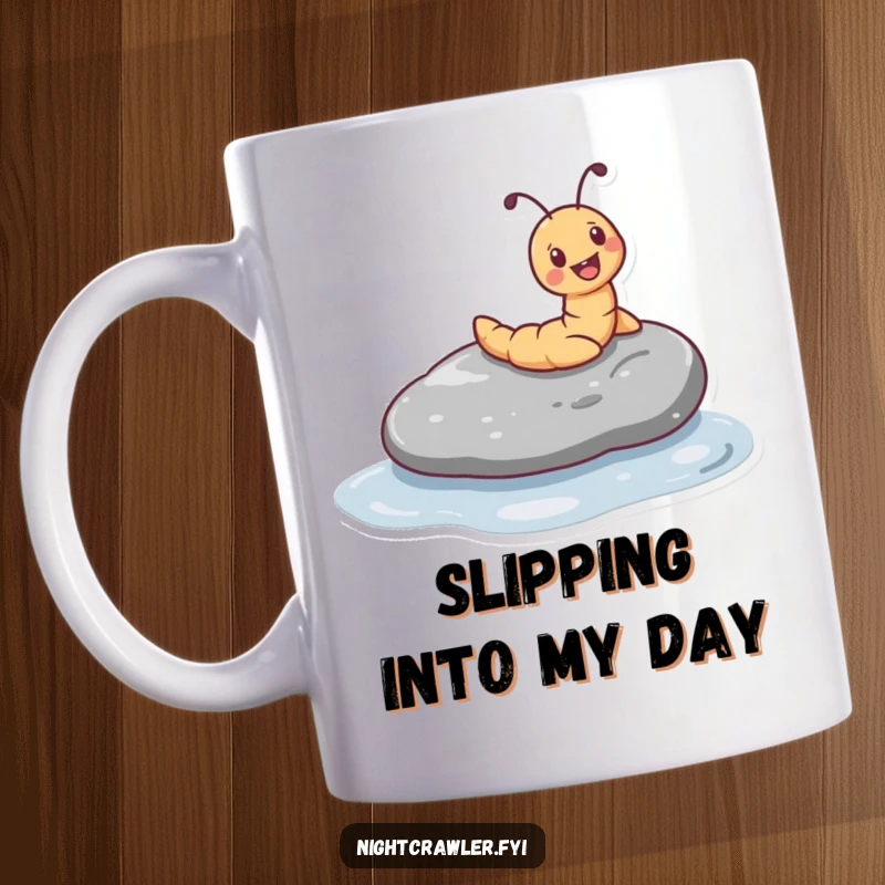 Funny mug showing a tiny worm character joyfully sliding down a smooth, wet pebble, capturing a moment of pure delight.