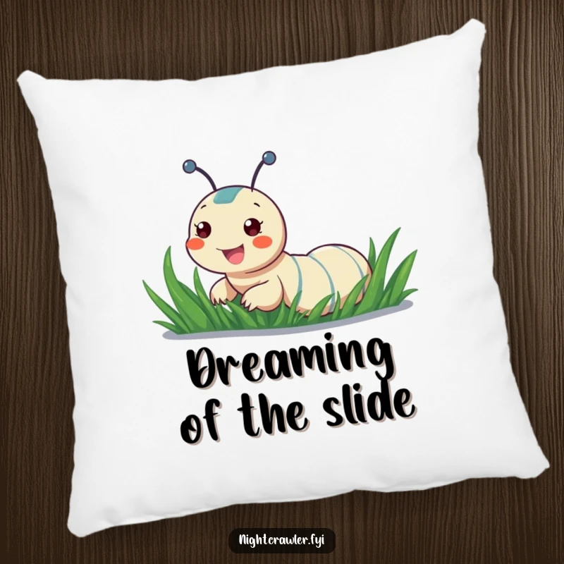 Funny pillow featuring a cheerful night crawler sliding down a dewy blade of grass, offering comfort with a playful design.