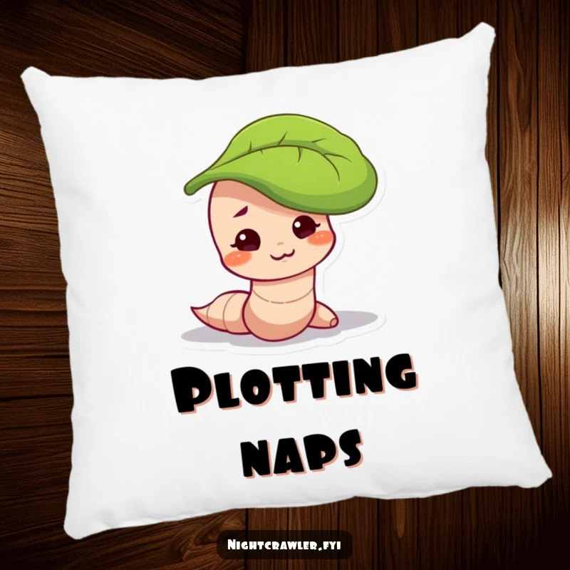 Funny pillow with a worm character with a mischievous smirk, peeking out from under a leaf, perfect for cozy comfort.