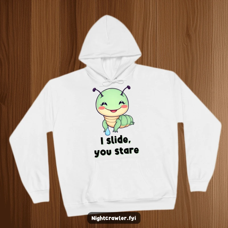 Funny hoodie depicting a cute, round night crawler character with a huge smile sliding down a glistening dewdrop, embracing pure fun.