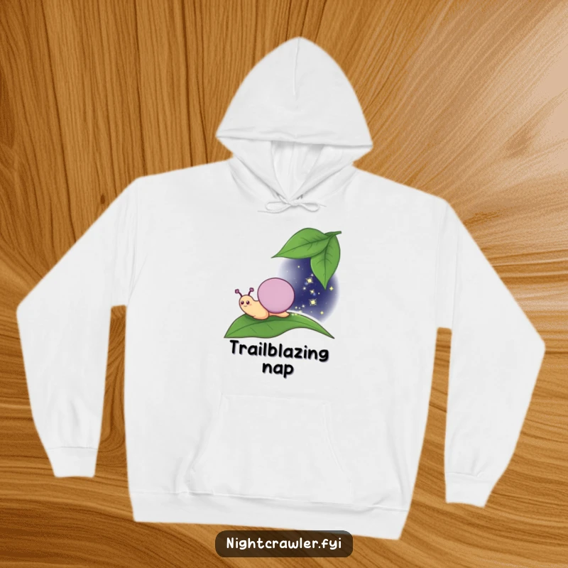 Funny Hoodie: Cozy character, a smiling snail, leaving a sparkly trail under the night sky, designed for warmth and enchanting spirit.