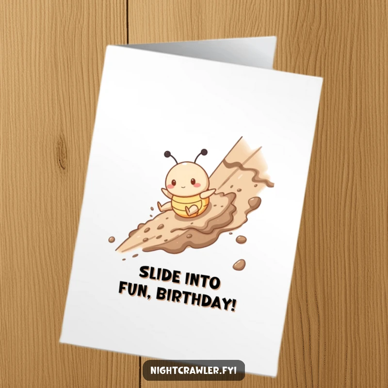 Funny Free Printable Birthday Card showing a cute buggy character gleefully sliding down a messy, muddy slope with pure delight.