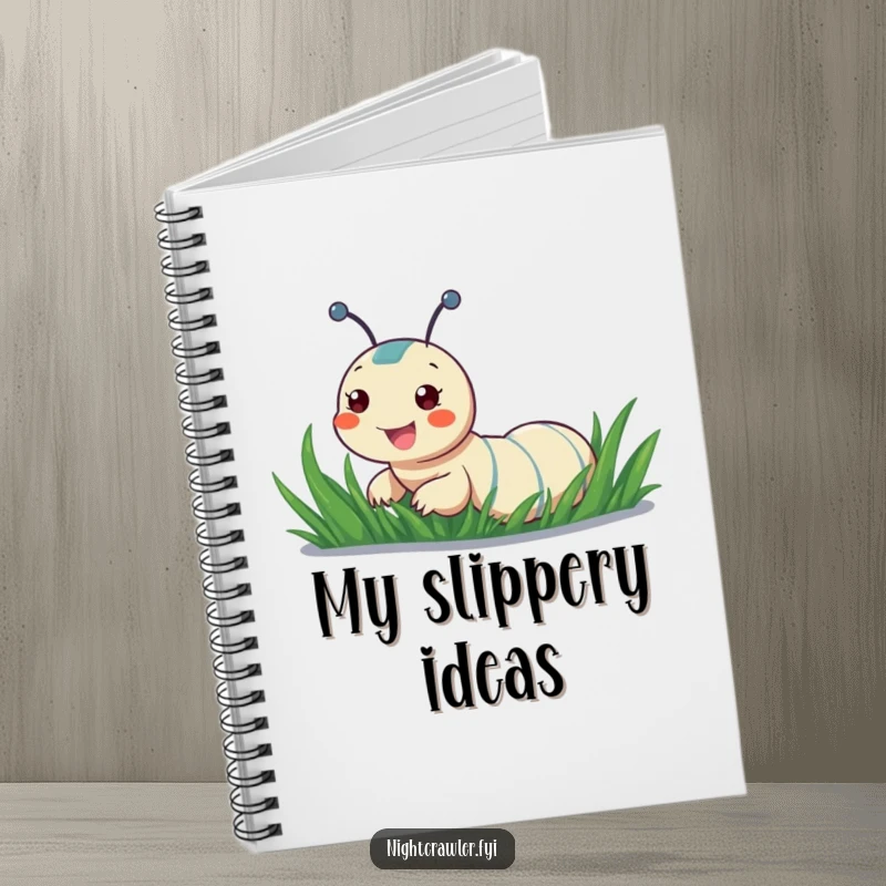 Funny notebook featuring a cheerful night crawler sliding down a dewy blade of grass, perfect for jotting down playful thoughts.