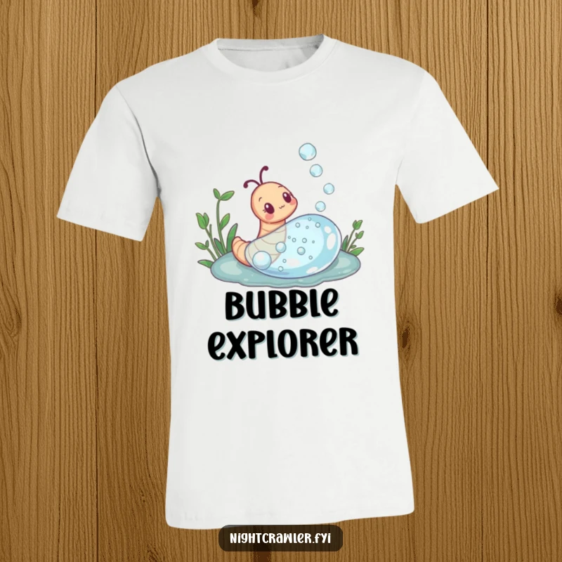 Funny t-shirt depicting a curious earthworm examining a giant dewdrop with awe, embodying a spirit of exploration and wonder.