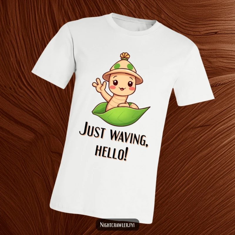 Funny Earthworm Hat T-Shirt: Cute worm in a tiny hat waving hello from a leaf, a funny and welcoming gift.