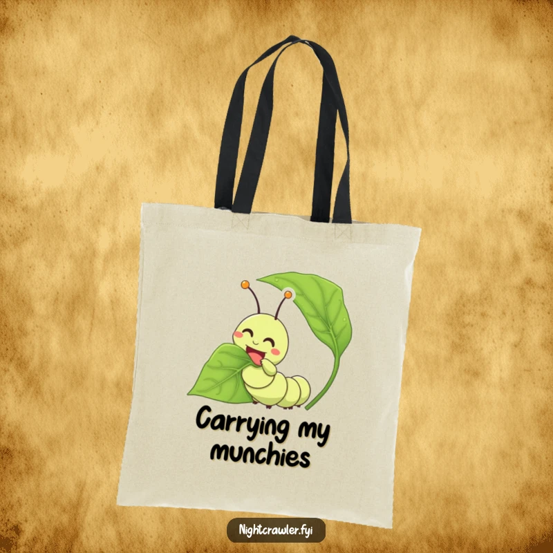 Funny caterpillar tote bag with a character joyfully munching on a huge leaf, perfect for carrying treats.