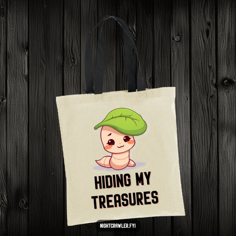Funny tote bag featuring a worm character with a mischievous smirk, peeking out from under a leaf, perfect for carrying secrets.