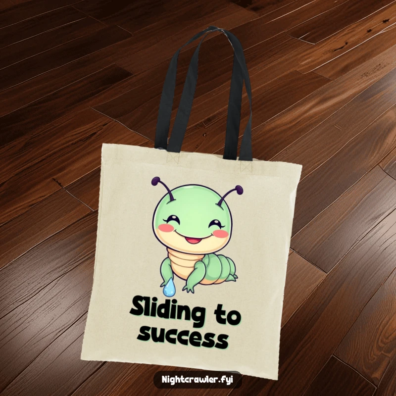 Funny tote bag displaying a cheerful, round night crawler character in mid-slide down a dewdrop, radiating pure, unadulterated joy.